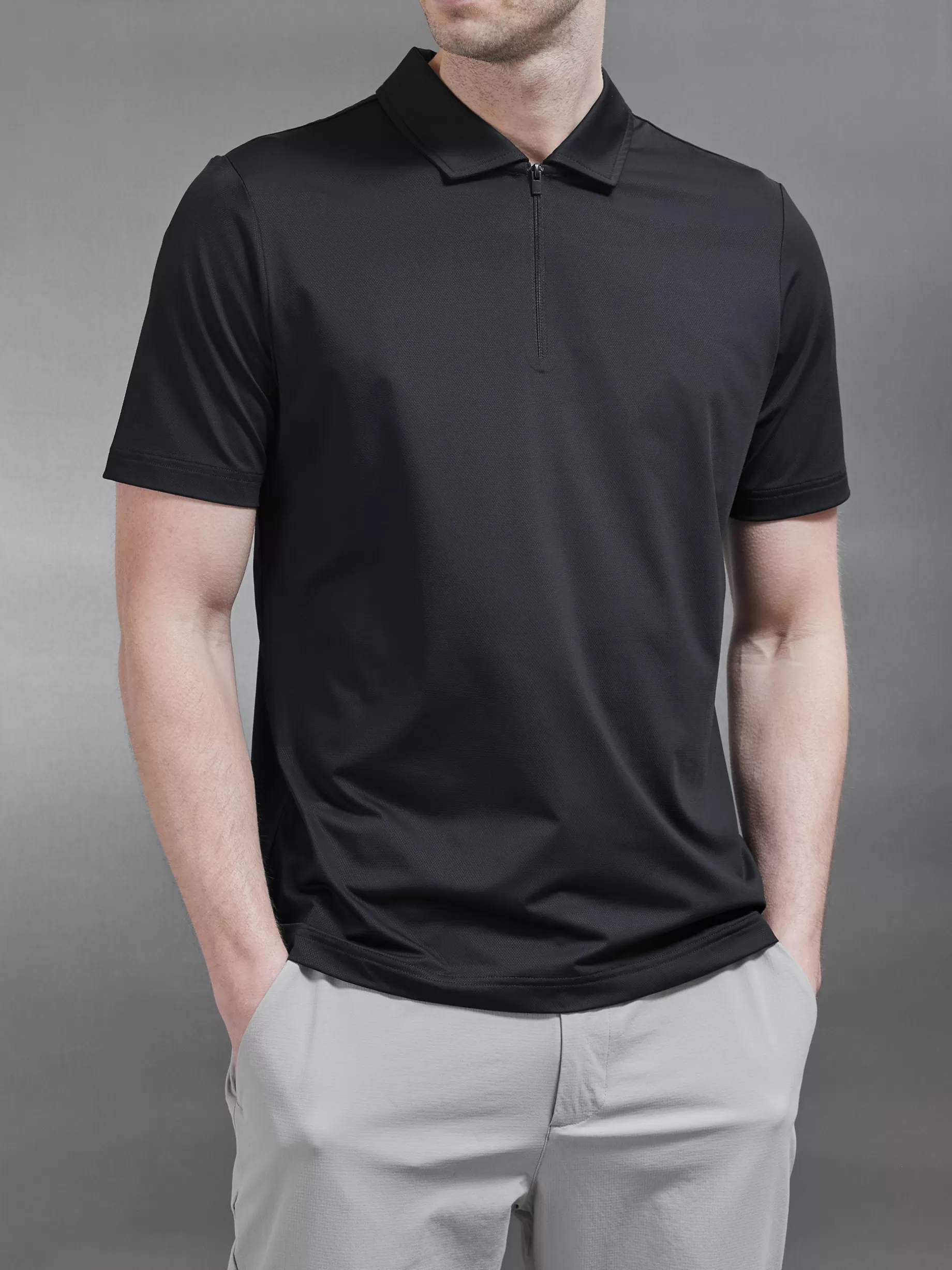 Shop ARNE Golf Technical Zip Polo Shirt - Black