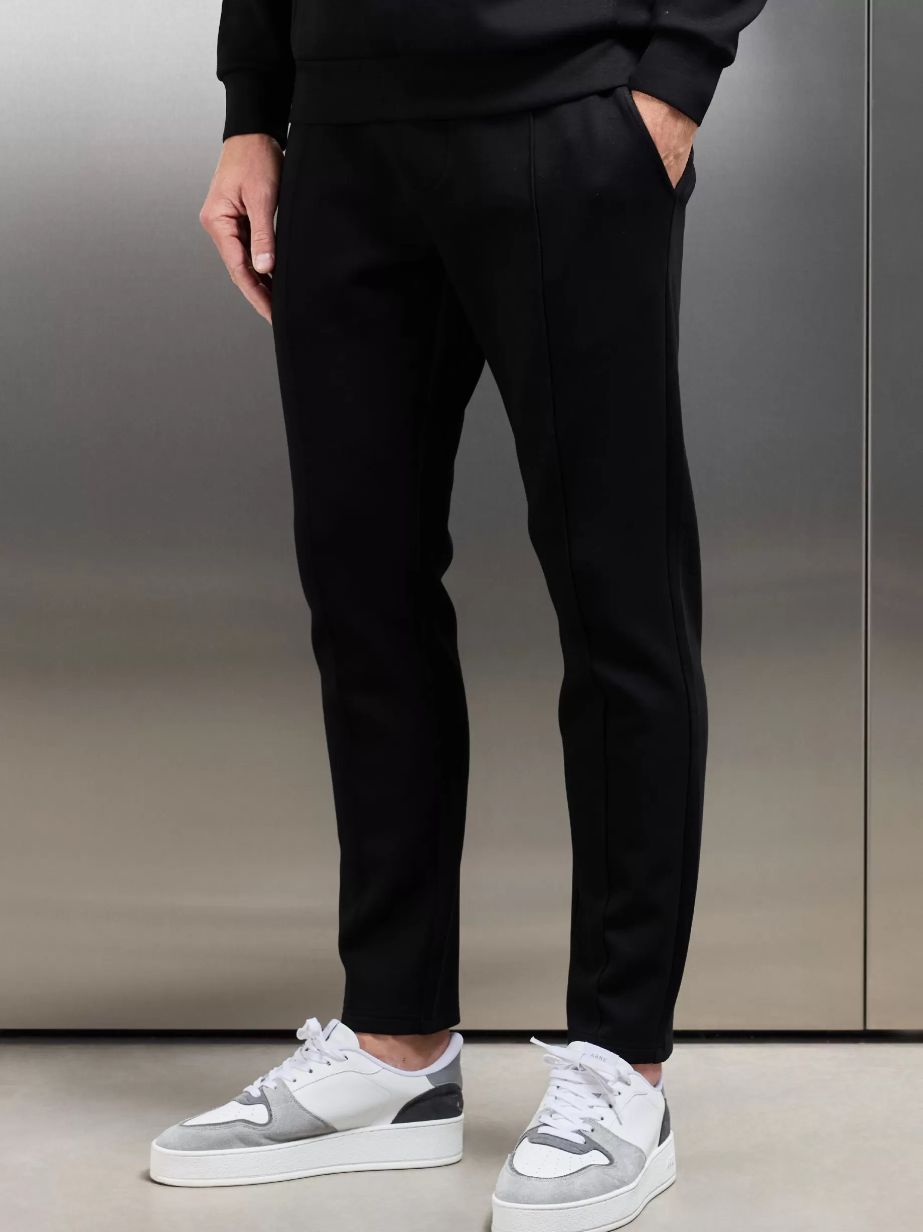 Shop ARNE Interlock Jersey Tapered Jogger - Black