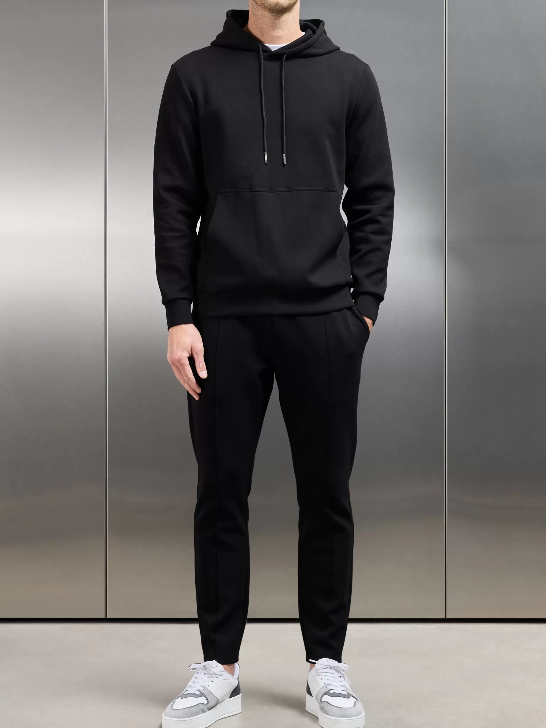 Shop ARNE Interlock Jersey Tapered Jogger - Black