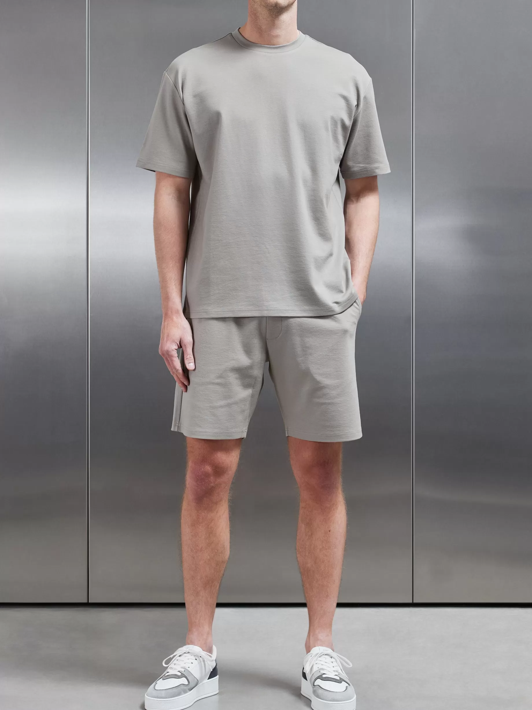 Shop ARNE Interlock Relaxed Fit T-Shirt - Stone